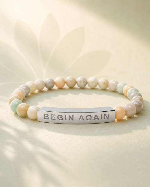 Promotional view of the silver-tone Amazonite bracelet with fixed BEGIN AGAIN engraving